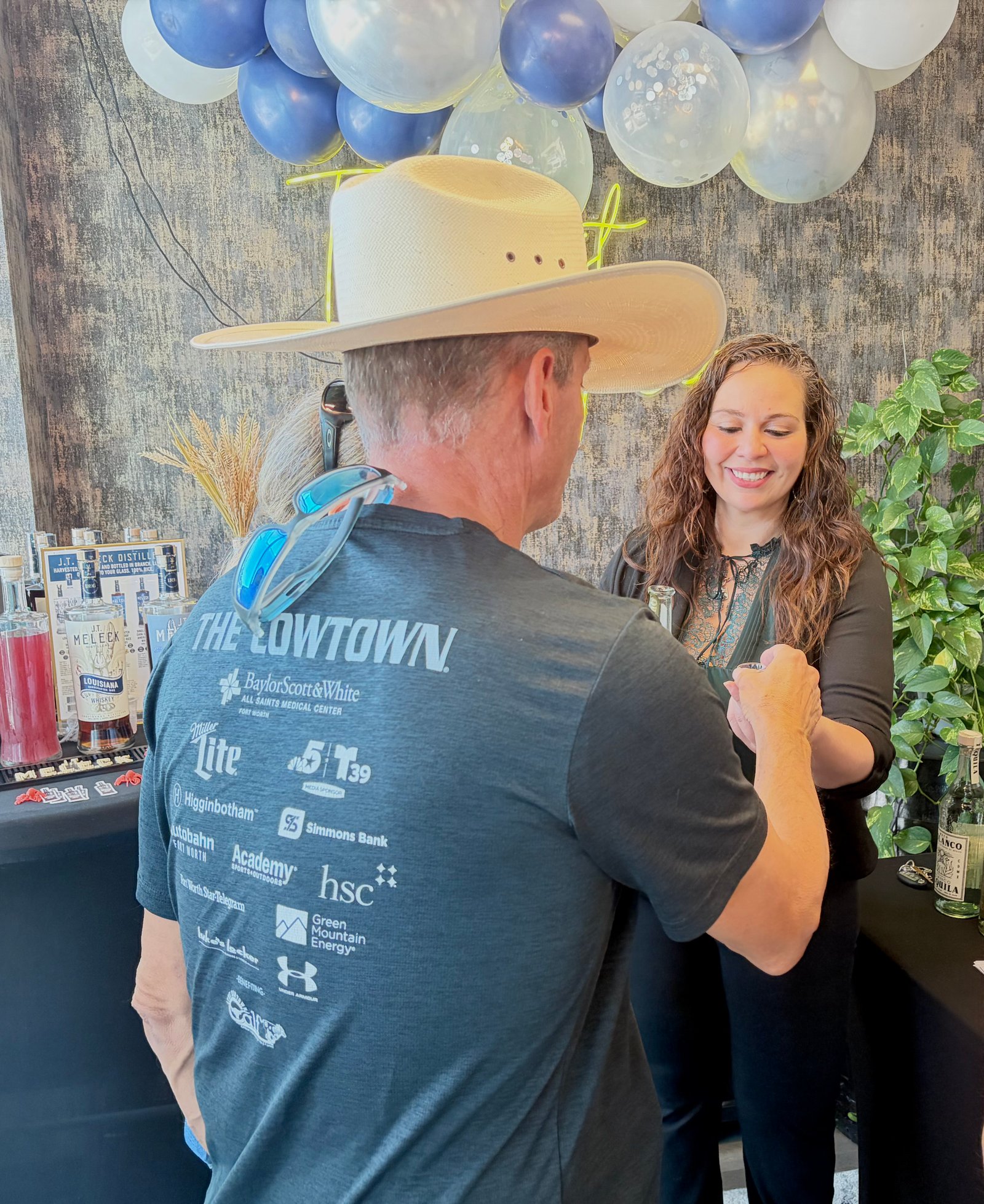 N.O.I.R. specialist engaging a consumer at a Polanco tequila tasting